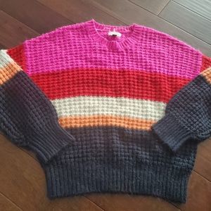 Pink, red orange black and cream color sweater size medium by Universal …